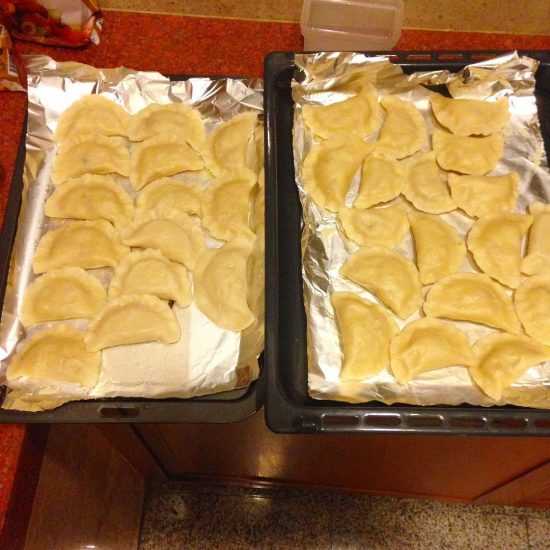 We finally finished making pierogi. It took us for 2 nights to finish making them. Our skills have been improving. There were no broken ones this time. Hehe They look beautiful.  We are proud of ourselves.