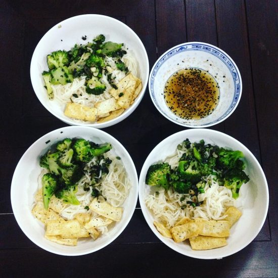 Noodles with stir-fry Broccoli & ginger & spring onions & garlic & black sesame and fried tofu. i didn't have sesame oil so I used extra virgin olive oil instead.  I got this healthy recipe from Jamie Oliver 's page) #islandlife 🌴#serebiifoodjournal