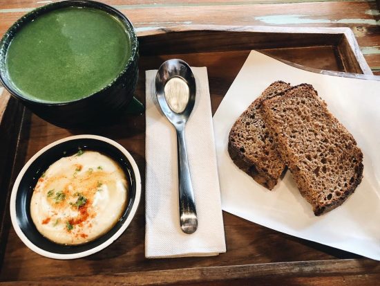 Vegan green soup with sourdough bread